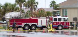 Fire Fighters visit Property in Destin whose dune caught on fire